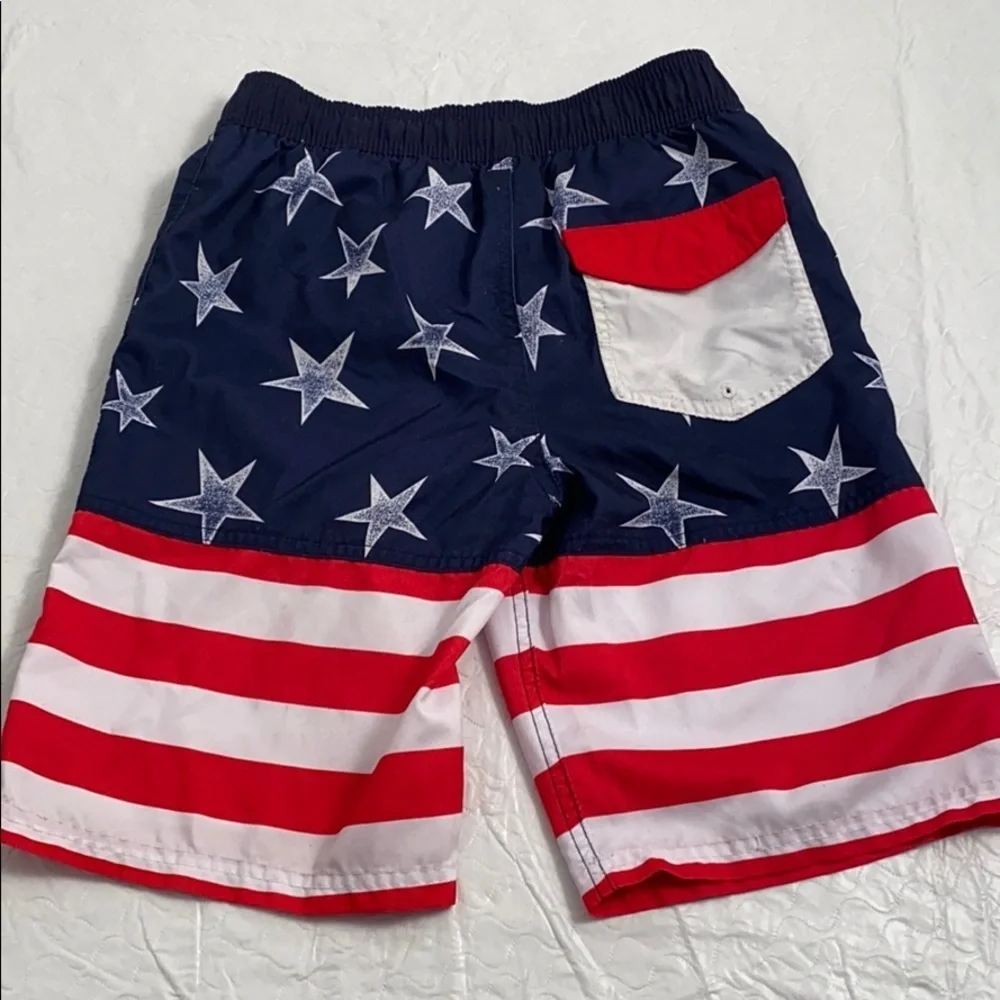 Cat and Jack American Flag red white blue swim trunks L = 12-14